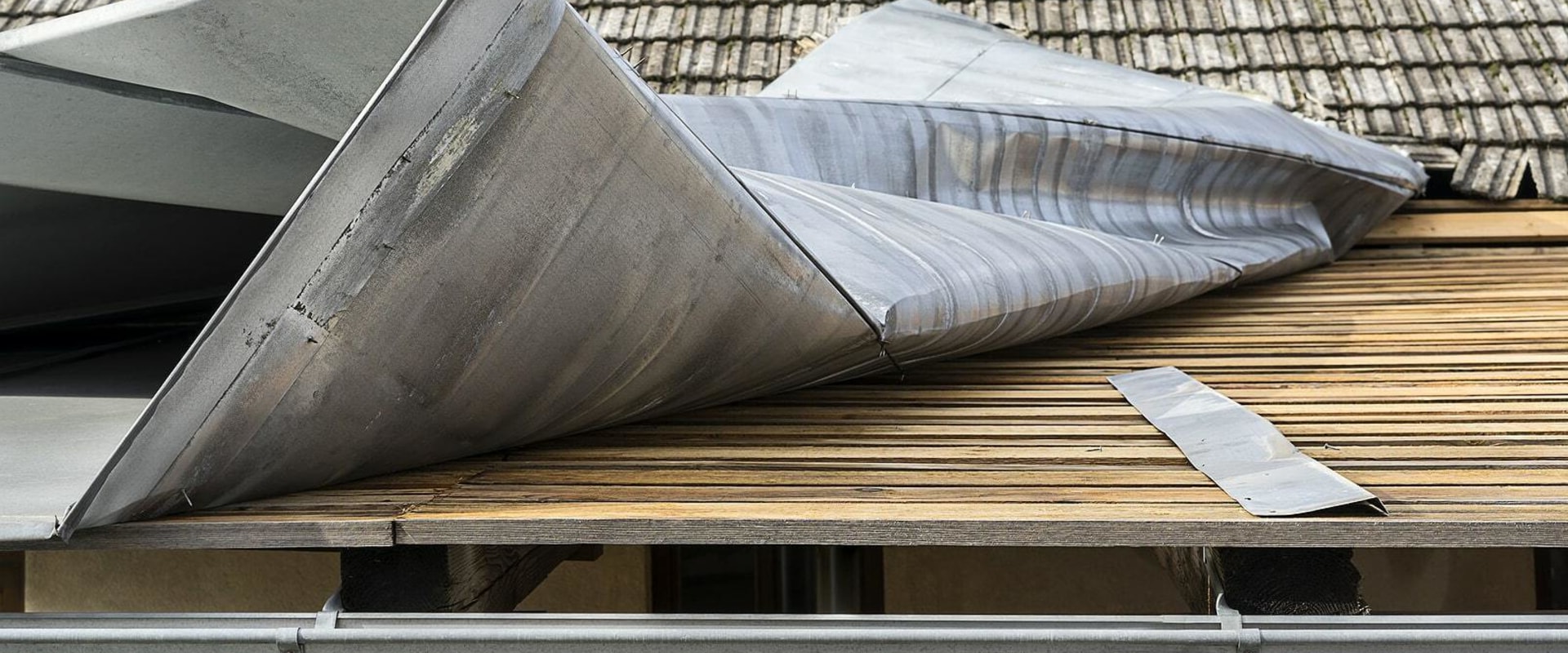 What are the downsides of a metal roof?