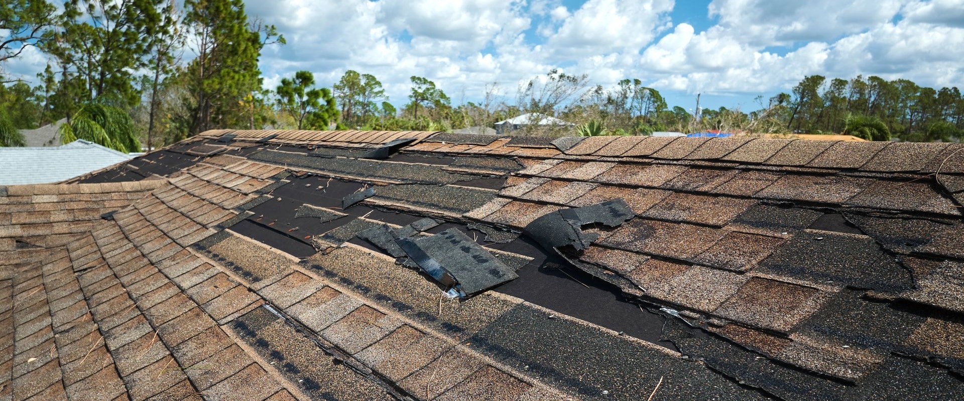 What wind speed can cause roof damage?