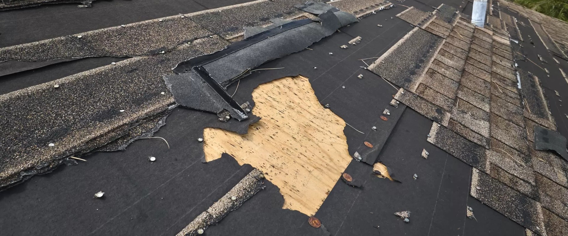 What does storm damage to roof look like?